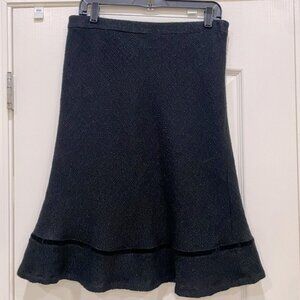 fully lined A-line wool blend skirt. Ruffle hem Size 12